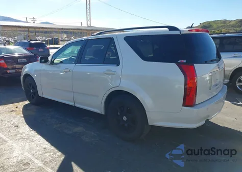 2009 Cadillac Srx V6 z USA, uszkodzony, nr VIN 1GYEE637390113015